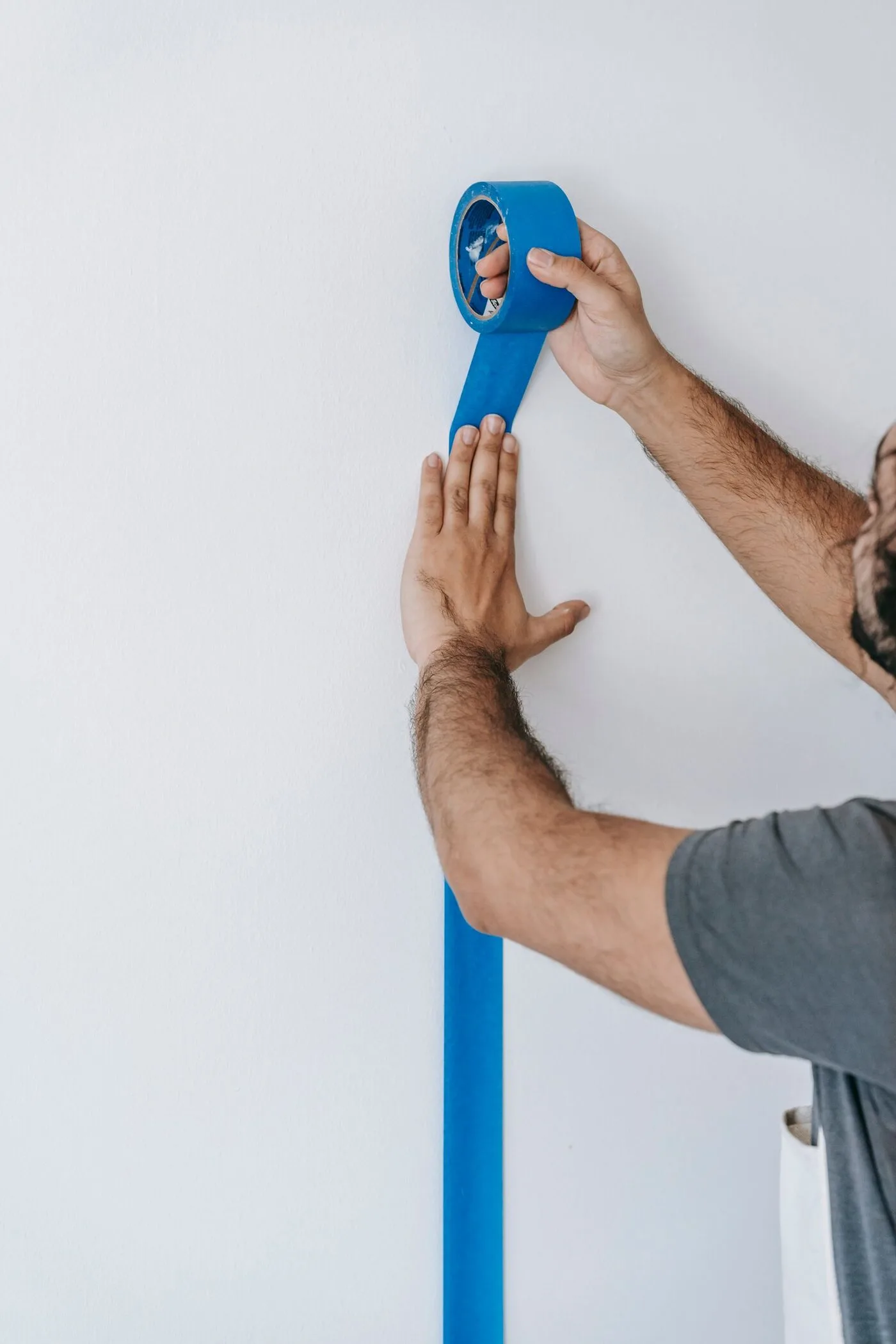 Wall edges masked with tape ahead of painting